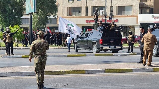 تشییع پیکر شهدای حشد شعبی در بغداد با شعار آمریکای تروریست