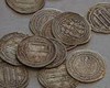 کشف 13 سکه دوره اشکانیان از یک قاچاقچی در خمینی شهر